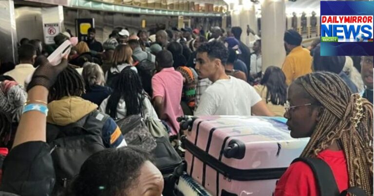 Passengers queue at JKIA during a past industrial strike by Kenya Aviation Workers Union in Nairobi.