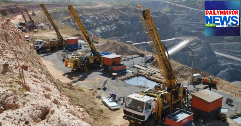 Several trucks at a mining site in Kenya