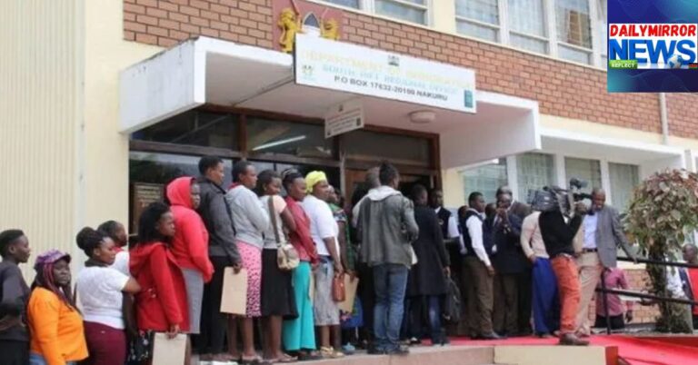 Kenyans seeking government services queue outside the Nakuru County government office on Tuesday, January 2021.